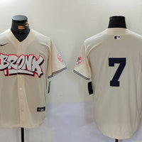 Men's New York Yankees Mickey Mantle #7 Cream Player Name Jersey1