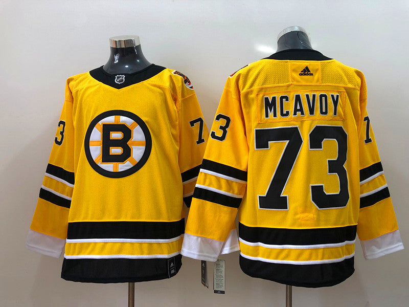 Men's Boston Bruins Charlie McAvoy #73 Yellow Replica Player Jersey1