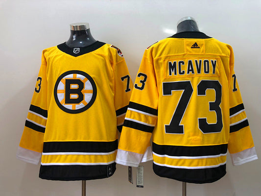 Men's Boston Bruins Charlie McAvoy #73 Yellow Replica Player Jersey1