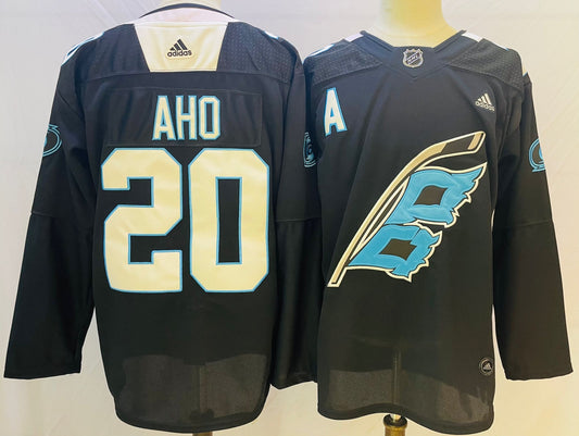 Men's Carolina Hurricanes Sebastian Aho #20 Black Player Jersey1