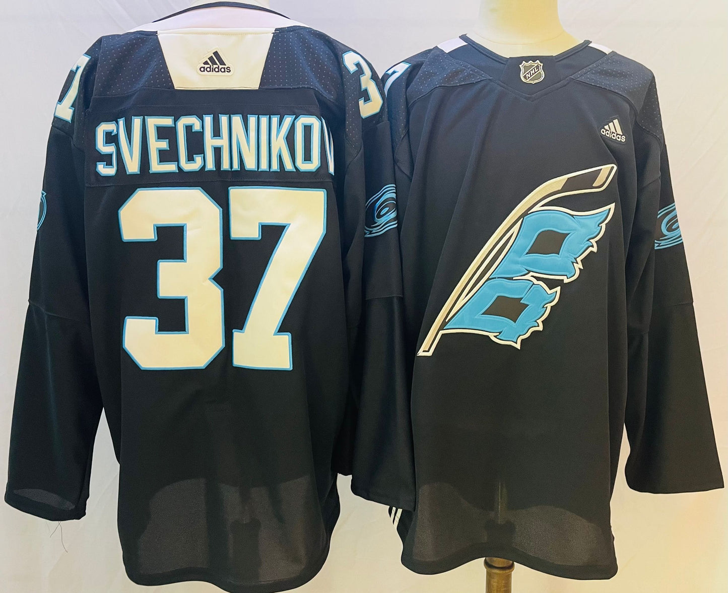 Men's Carolina Hurricanes Andrei Svechnikov #37 Black Home Breakaway Jersey1