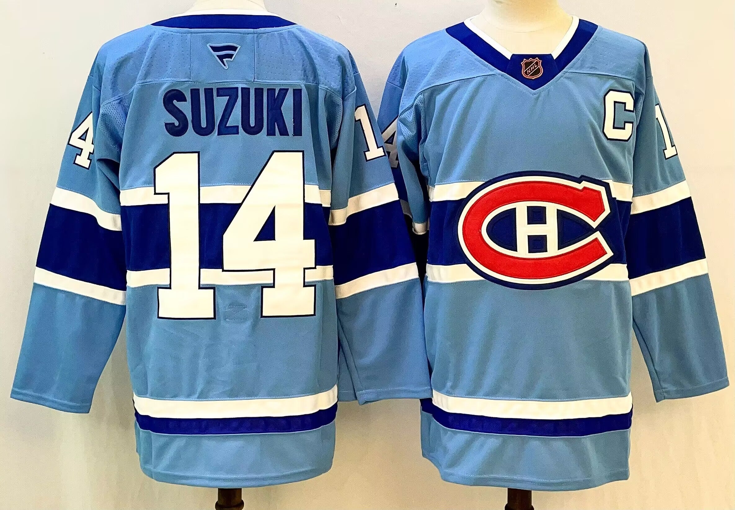 Men's Montreal Canadiens Nick Suzuki #14 Blue Breakaway Player Jersey
