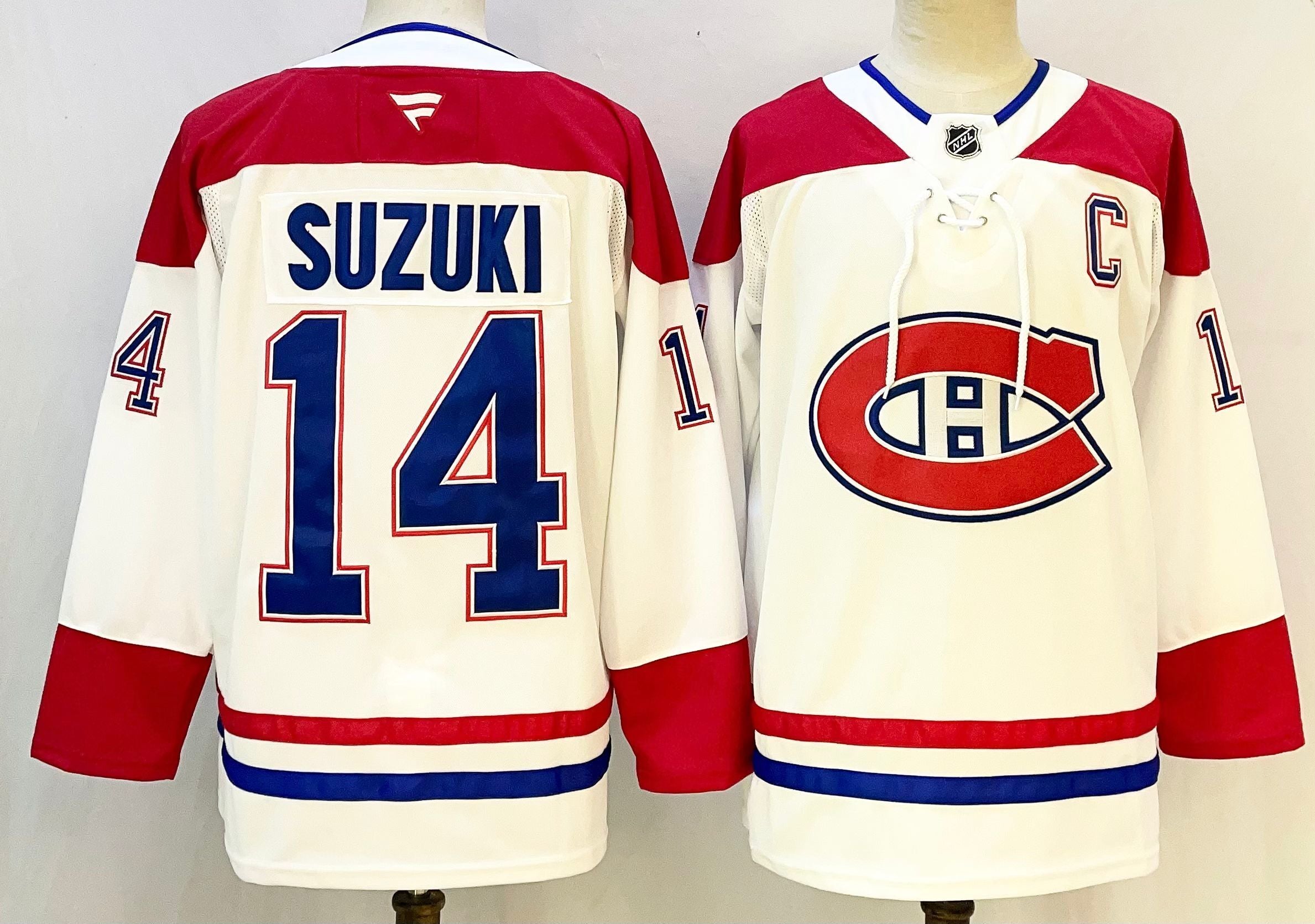 Men's Montreal Canadiens Nick Suzuki #14 White Breakaway Player Jersey
