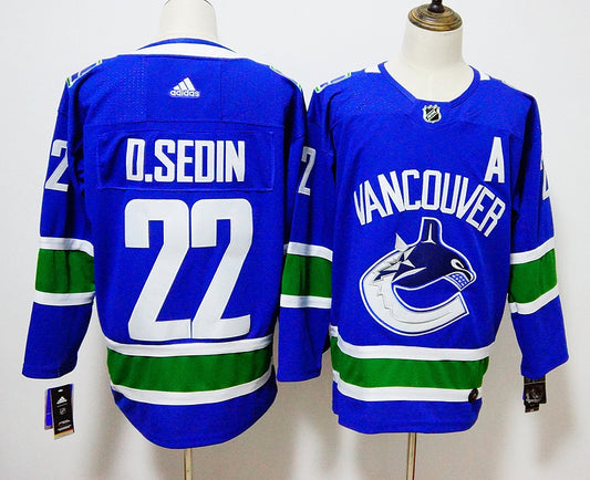 Men's Vancouver Canucks Brock Boeser Daniel Sedin #22 Blue Home Breakaway Jersey1